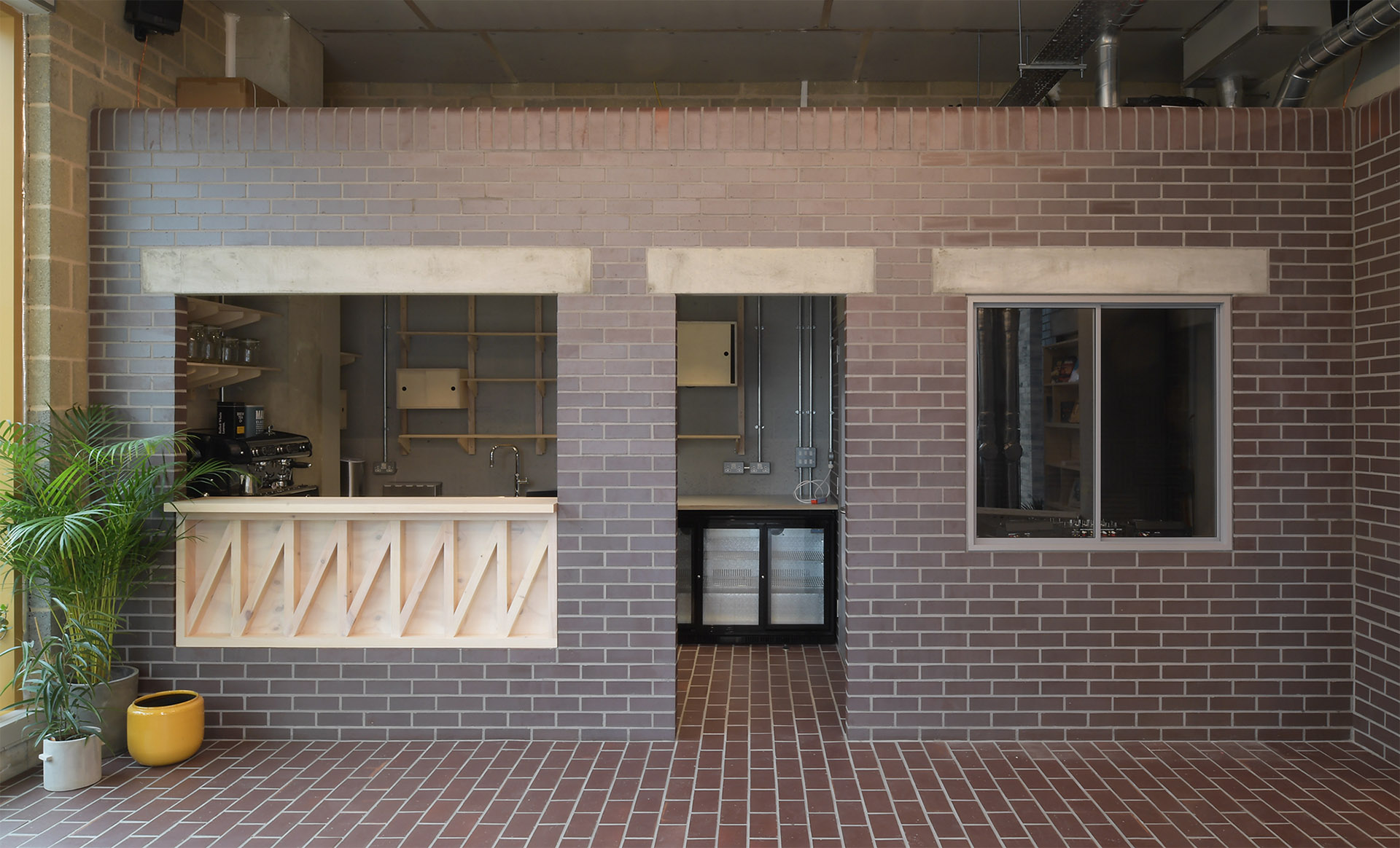 Taco gallery in Thamesmead uses Ketley brown brindle bricks and quarry tiles